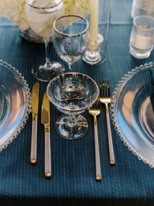Upgraded glassware and flatware at a Chicago Rooftop Wedding, showcasing elevated tabletop details and refined modern design.