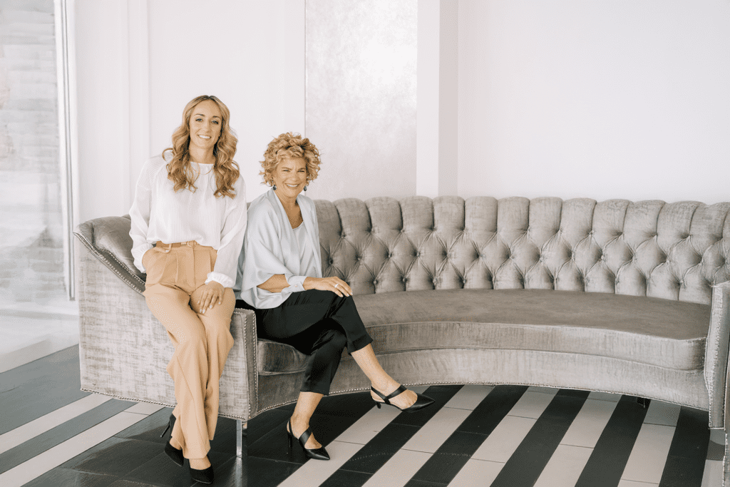 Wedding planner coordinating setup at a Chicago reception venue as part of the Chicago wedding planning timeline.