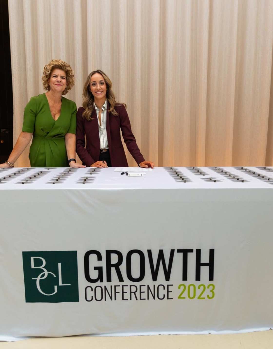 Effortless Events team managing the VIP dinner registration desk for the Chicago Financial Growth Conference, ensuring a seamless guest arrival experience.