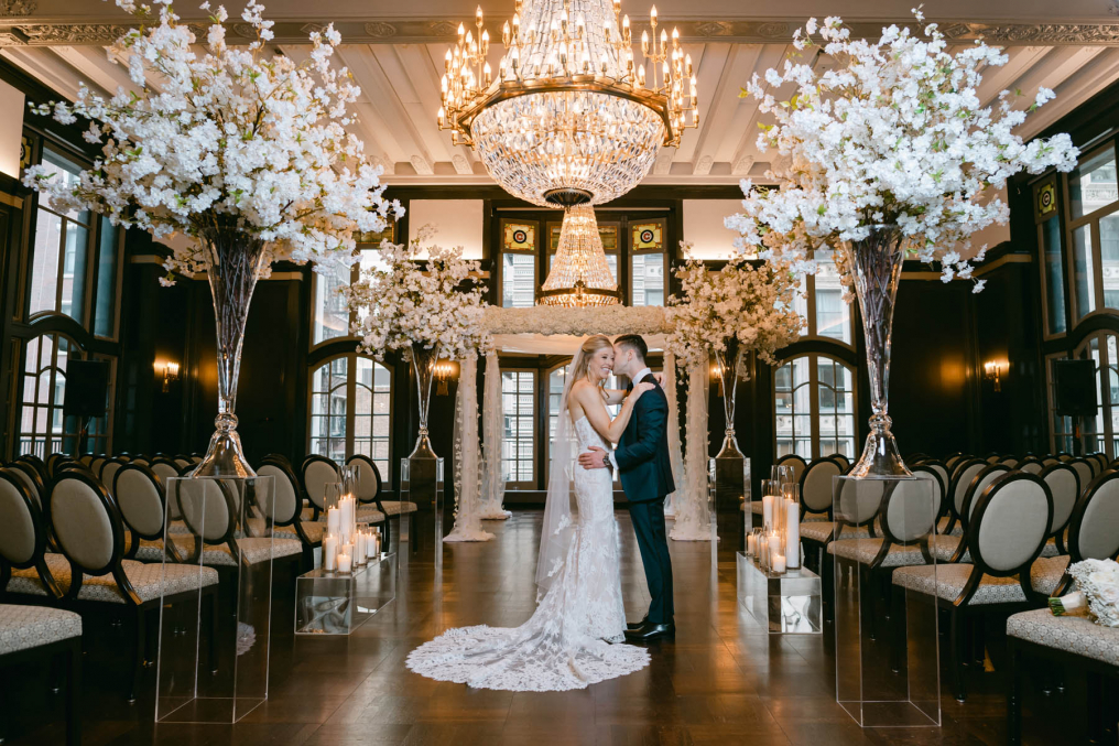 bride and groom kissing at the iconic chicago athletic association