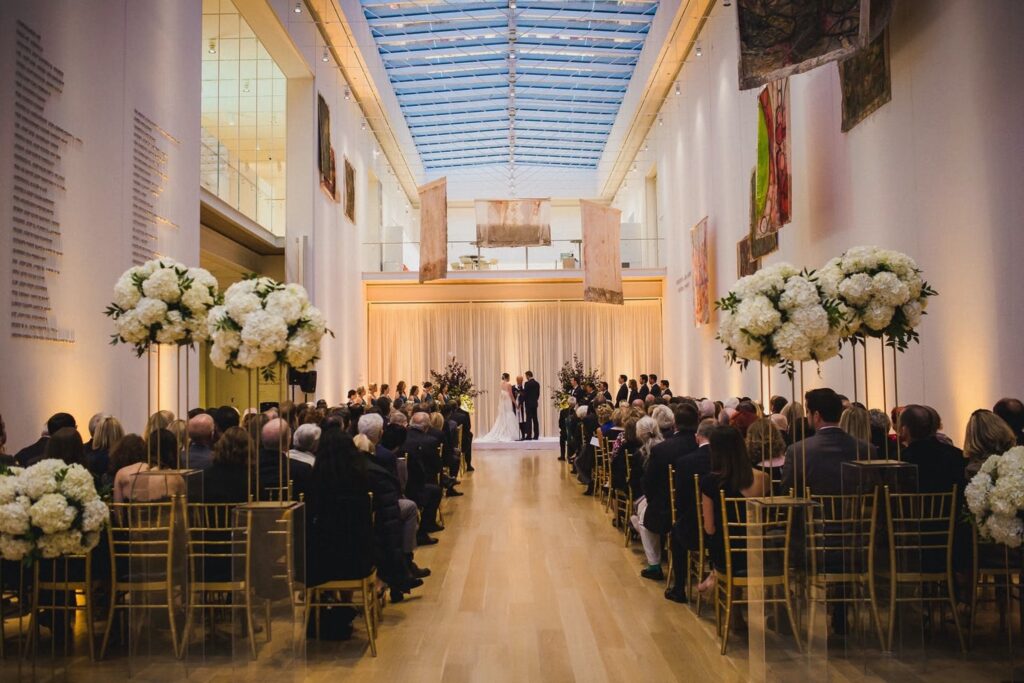 Elegant outdoor wedding ceremony setup in McKinlock Court at the Art Institute of Chicago.