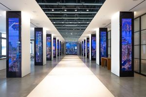 Immersive Chicago lobby with digital cityscapes, sleek lighting, and modern architecture for tech-forward events.